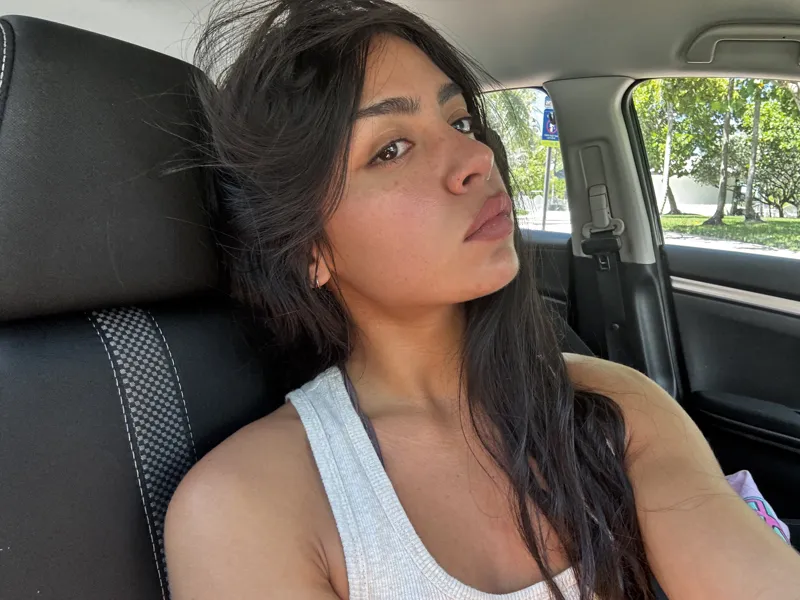 Zoe in a white top
